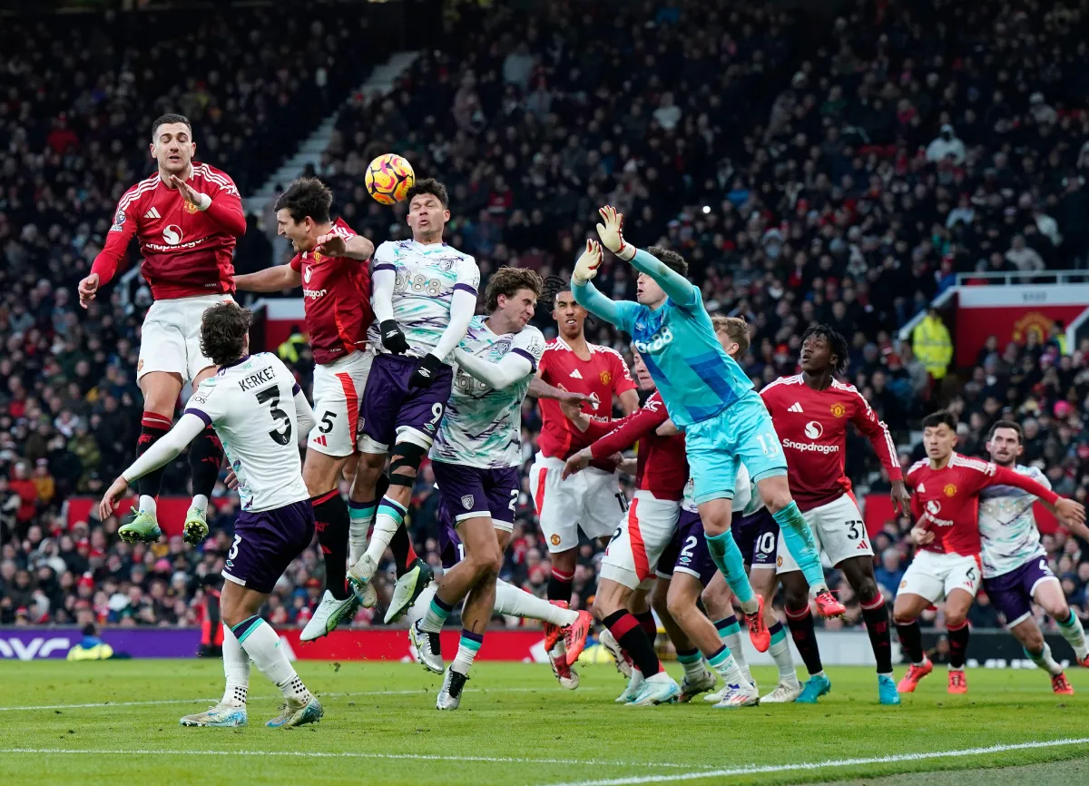 Harry Maguire of Manchester United with Evanilson of Bournemouth during the Premier League match at Old Trafford, Manchester.