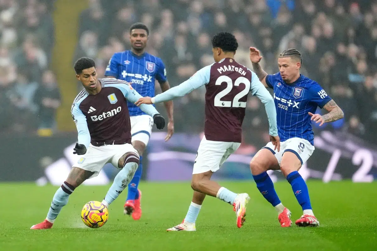 Marcus Rashford and Ian Maatsen battle for the ball with Kalvin Phillips during a Premier League match