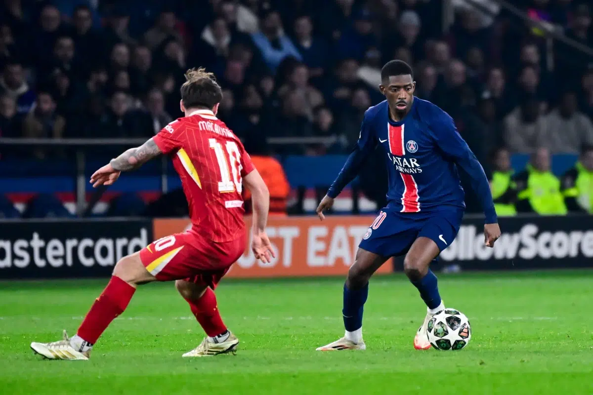 Ousmane Dembele takes on Alexis Mac Allister during the UEFA Champions League