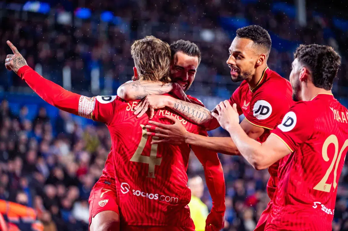 Sergio Ramos (L) of Sevilla celebrates a goal with his teammates (from L to R) Lucas Ocampos, Djibril Sow and Fernando Francisco Reges Mouta